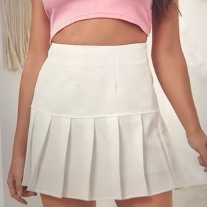 white pleated mini tennis skirt